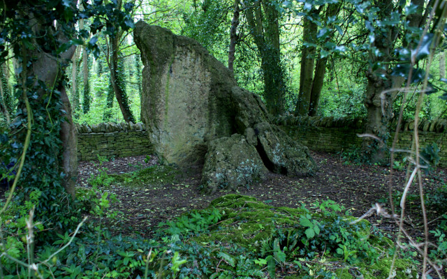 The Hoar Stone, from the cross-roads side, with fallen stones visible on the ground